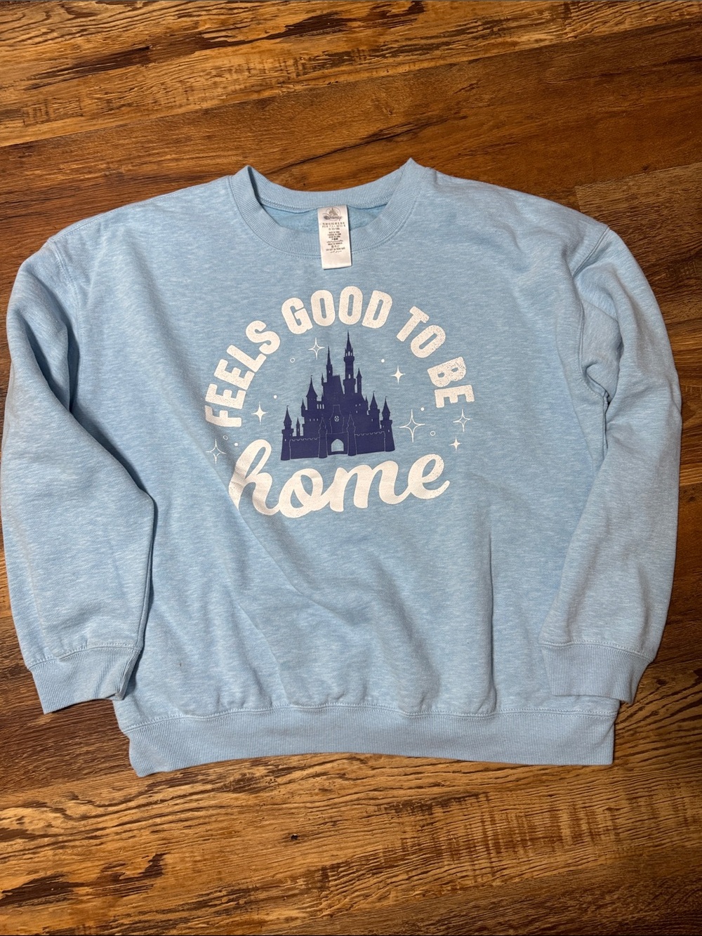 Light Blue Disney Sweatshirt "Feels Good to Be Home" with Navy Castle Graphic